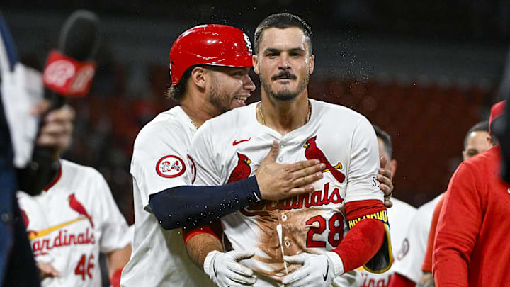 Aug 21, 2024; St. Louis, Missouri, USA;  St. Louis Cardinals third baseman Nolan Arenado (28) celebrates with catcher Willson Contreras (40) after hitting a walk-off grand slam against the Milwaukee Brewers during the tenth inning at Busch Stadium. Mandatory Credit: Jeff Curry-Imagn Images