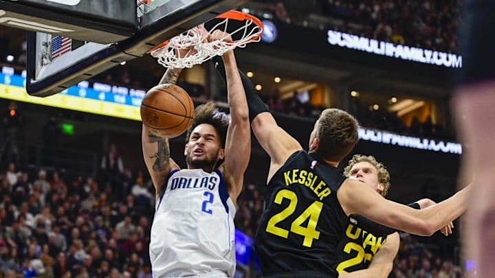 Jan 1, 2024; Salt Lake City, Utah, USA; Dallas Mavericks center Dereck Lively II (2) dunks over Utah