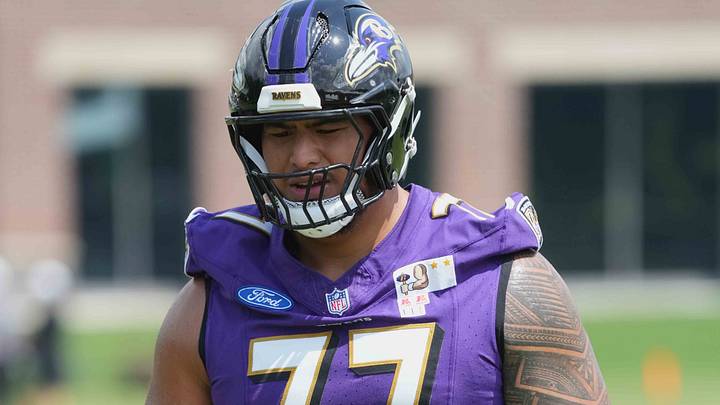 Jul 23, 2025; Owings Mills, MD, USA; Baltimore Ravens guard Daniel Faalele (77) warms up during training camp at Under Armour Performance Center. Mandatory Credit: Mitch Stringer-Imagn Images Jul 23, 2025; Owings Mills, MD, USA; Baltimore Ravens guard Daniel Faalele (77) warms up during training camp at Under Armour Performance Center. Mandatory Credit: Mitch Stringer-Imagn Images