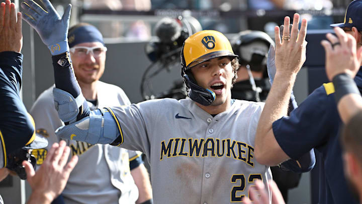 Aug 30, 2025; Toronto, Ontario, CAN; Milwaukee Brewers designated hitter Christian Yelich (22) celebrates with team mates in the duout after hitting a solo home run against the Toronto Blue Jays in the ninth inning at Rogers Centre. Mandatory Credit: Dan Hamilton-Imagn Images Aug 30, 2025; Toronto, Ontario, CAN; Milwaukee Brewers designated hitter Christian Yelich (22) celebrates with team mates in the duout after hitting a solo home run against the Toronto Blue Jays in the ninth inning at Rogers Centre. Mandatory Credit: Dan Hamilton-Imagn Images