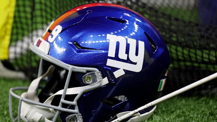Oct 5, 2025; New Orleans, Louisiana, USA; A detail view of a New York Giants helmet on the sideline during the first half at Caesars Superdome. Mandatory Credit: Stephen Lew-Imagn Images