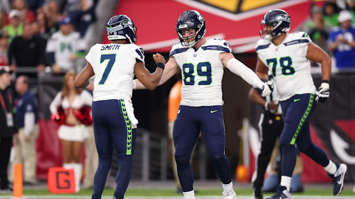 Will Dissly and Geno Smith of the Seattle Seahawks
