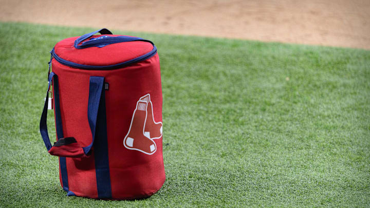 Apr 29, 2021; Arlington, Texas, USA; A view of the Boston Red Sox logo and a field bag during batting practice before the game between the Texas Rangers and the Boston Red Sox at Globe Life Field. Mandatory Credit: Jerome Miron-Imagn Images Apr 29, 2021; Arlington, Texas, USA; A view of the Boston Red Sox logo and a field bag during batting practice before the game between the Texas Rangers and the Boston Red Sox at Globe Life Field. Mandatory Credit: Jerome Miron-Imagn Images