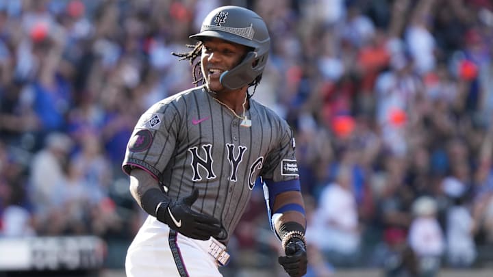 Sep 21, 2024; New York City, New York, USA; New York Mets shortstop Luisangel Acuña (2) celebrates after hitting a home run during the second inning against the Philadelphia Phillies at Citi Field. Mandatory Credit: Lucas Boland-Imagn Images
