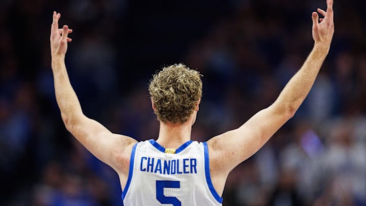 Feb 17, 2026; Lexington, Kentucky, USA; Kentucky Wildcats guard Collin Chandler (5) celebrates after scoring a three point basket during the first half against the Georgia Bulldogs at Rupp Arena at Central Bank Center. Mandatory Credit: Jordan Prather-Imagn Images
