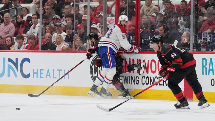 May 29, 2026; Raleigh, North Carolina, USA; Montreal Canadiens defenseman Noah Dobson (53) defends against the Carolina Hurricanes in game five of the Eastern Conference Final of the 2026 Stanley Cup Playoffs during the third period at Lenovo Center. Mandatory Credit: James Guillory-Imagn Images