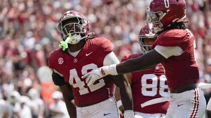 Sep 13, 2025; Tuscaloosa, Alabama, USA;  Alabama linebacker Yhonzae Pierre (42) celebrates a sack with Alabama linebacker Deontae Lawson (0) during the game with Wisconsin at Saban Field at Bryant-Denny Stadium. Mandatory Credit: Gary Cosby-USA TODAY Network via Imagn Images