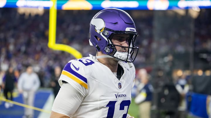 Jan 13, 2025; Glendale, AZ, USA; Minnesota Vikings quarterback Daniel Jones (13) against the Los Angeles Rams during an NFC wild card game at State Farm Stadium. Mandatory Credit: Mark J. Rebilas-Imagn Images