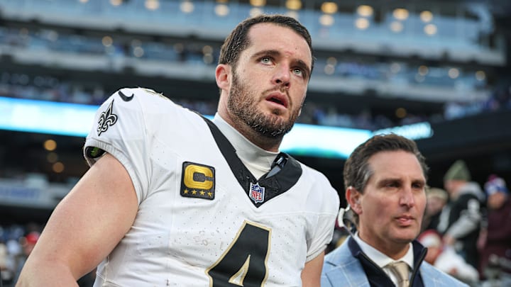 Dec 8, 2024; East Rutherford, New Jersey, USA; New Orleans Saints quarterback Derek Carr (4) walks off the field after field after an injury during the fourth quarter at MetLife Stadium. Mandatory Credit: Vincent Carchietta-Imagn Images