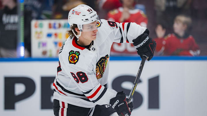 Mar 15, 2025; Vancouver, British Columbia, CAN; Chicago Blackhawks forward Connor Bedard (98) shoots during warm up prior to a game against the Vancouver Canucks at Rogers Arena. Mandatory Credit: Bob Frid-Imagn Images