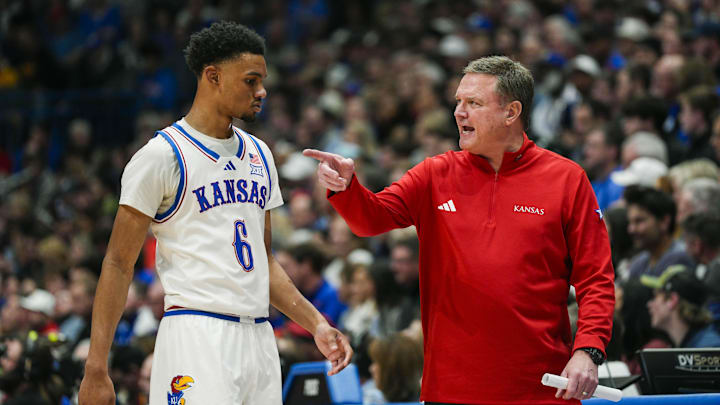 Feb 3, 2025; Lawrence, Kansas, USA; Kansas Jayhawks head coach Bill Self talks to guard Rylan Griffen (6) during the second half against the Iowa State Cyclones at Allen Fieldhouse. Mandatory Credit: Jay Biggerstaff-Imagn Images