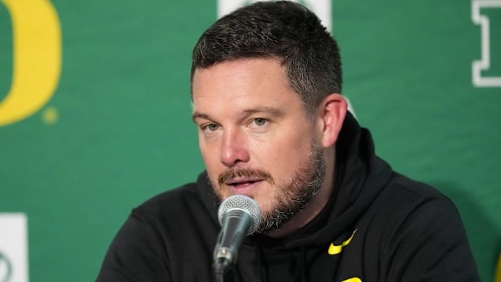 Nov 16, 2024; Madison, Wisconsin, USA; Oregon Ducks head coach Dan Lanning talks to the media during the post game press conference following the game against the Wisconsin Badgers at Camp Randall Stadium. Mandatory Credit: Jeff Hanisch-Imagn Images Nov 16, 2024; Madison, Wisconsin, USA; Oregon Ducks head coach Dan Lanning talks to the media during the post game press conference following the game against the Wisconsin Badgers at Camp Randall Stadium. Mandatory Credit: Jeff Hanisch-Imagn Images