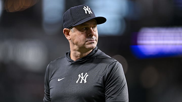 Apr 29, 2026; Arlington, Texas, USA; New York Yankees manager Aaron Boone (17) walks back to the dugout during the eighth inning against the Texas Rangers at Globe Life Field. Mandatory Credit: Jerome Miron-Imagn Images
