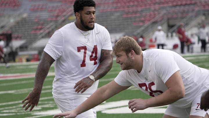 Sep 14, 2024; Madison, Wisconsin, USA; Alabama Crimson Tide offensive lineman Kadyn Proctor (74) is shown with offensive lineman Wilkin Formby (75) before a game against the Wisconsin Badgers at Camp Randall Stadium. Mandatory Credit: ?Mark Hoffman/USA TODAY Network via Imagn Images