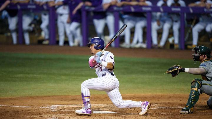 Apr 28, 2026; Baton Rouge, LA, USA; Louisiana State Tigers infielder Steven Milam (4) bats against the Southeastern Louisiana Lions at Alex Box Stadium. Mandatory Credit: Matthew Hinton-Imagn Images Apr 28, 2026; Baton Rouge, LA, USA; Louisiana State Tigers infielder Steven Milam (4) bats against the Southeastern Louisiana Lions at Alex Box Stadium. Mandatory Credit: Matthew Hinton-Imagn Images