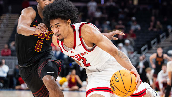 Mar 12, 2025; Indianapolis, IN, USA; Rutgers Scarlet Knights guard Dylan Harper (2) dribbles the ball while USC Trojans guard Wesley Yates III (6) defends in the second half at Gainbridge Fieldhouse. Mandatory Credit: Trevor Ruszkowski-Imagn Images Mar 12, 2025; Indianapolis, IN, USA; Rutgers Scarlet Knights guard Dylan Harper (2) dribbles the ball while USC Trojans guard Wesley Yates III (6) defends in the second half at Gainbridge Fieldhouse. Mandatory Credit: Trevor Ruszkowski-Imagn Images