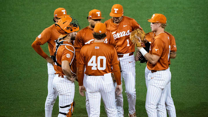 The Texas Longhorns meet on the pitchers mound mid-game inning as they take on the University of Incarnate Word Cardinals at UFCU Disch-Falk Field in Austin, Feb. 25, 2025.