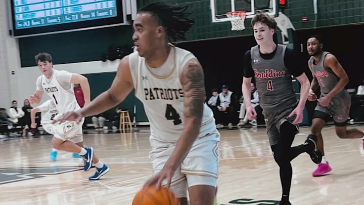 John Carroll’s Aidan Able (4) pushes up court during Sunday’s Baltimore Catholic League Tournament quarterfinal match against Archbishop Spalding at Loyola University of Maryland. Able had 14 points and nine rebounds as his outstanding four-year varsity career ended in a 74-53 loss to the Cavaliers. John Carroll’s Aidan Able (4) pushes up court during Sunday’s Baltimore Catholic League Tournament quarterfinal match against Archbishop Spalding at Loyola University of Maryland. Able had 14 points and nine rebounds as his outstanding four-year varsity career ended in a 74-53 loss to the Cavaliers.