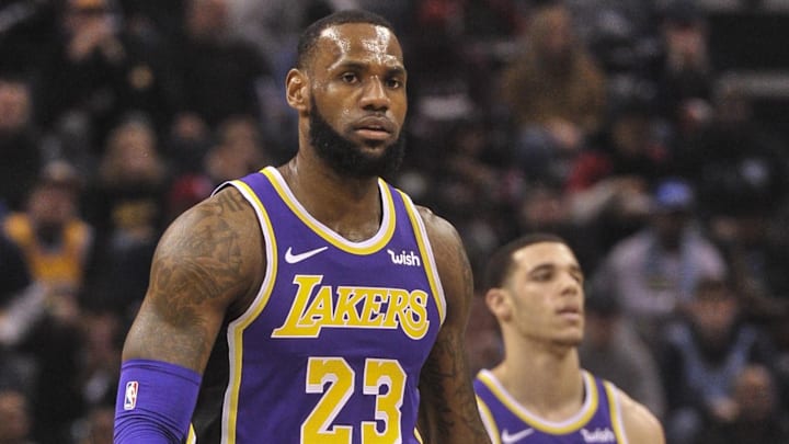 Los Angeles Lakers forward LeBron James (23) and Los Angeles Lakers guard Lonzo Ball (2) during the first half against the Memphis Grizzlies at FedExForum. Mandatory Credit: Justin Ford-Imagn Images