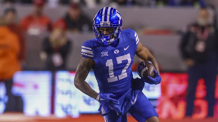 Nov 9, 2024; Salt Lake City, Utah, USA; Brigham Young Cougars wide receiver Keelan Marion (17) runs after a catch against the Utah Utes during the first quarter at Rice-Eccles Stadium. Mandatory Credit: Rob Gray-Imagn Images