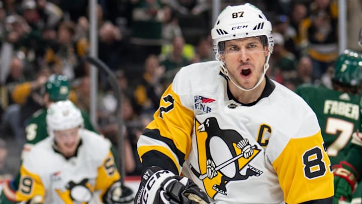 Feb 9, 2024; Saint Paul, Minnesota, USA; Pittsburgh Penguins center Sidney Crosby (87) celebrates a