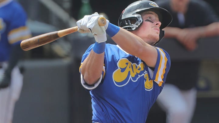 RubberDucks' Travis Bazzana follows a long fly ball to the wall in a game against the Altoona Curve on April 13, 2025, in Akron, Ohio.