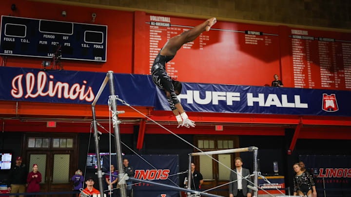 Azaraya Ra-Akbar performs on uneven bars at Illinois on Sunday, March 8, 2026 Azaraya Ra-Akbar performs on uneven bars at Illinois on Sunday, March 8, 2026