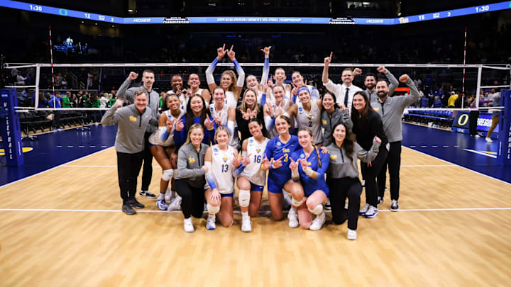 Pitt Volleyball Celebrates their Win vs. No. 4 Oregon in the Sweet 16 at the Petersen Events Center.