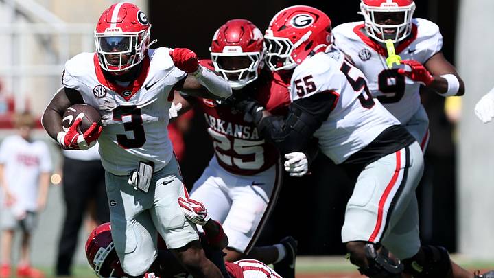Sep 19, 2026; Fayetteville, Arkansas, USA; Georgia Bulldogs running back Nate Frazier (3) runs with the ball against the Georgia Bulldogs Arkansas Razorbacks defensive back Shelton Lewis (2) during the second half at Donald W. Reynolds Razorback Stadium. Mandatory Credit: Nelson Chenault-Imagn Images Sep 19, 2026; Fayetteville, Arkansas, USA; Georgia Bulldogs running back Nate Frazier (3) runs with the ball against the Georgia Bulldogs Arkansas Razorbacks defensive back Shelton Lewis (2) during the second half at Donald W. Reynolds Razorback Stadium. Mandatory Credit: Nelson Chenault-Imagn Images
