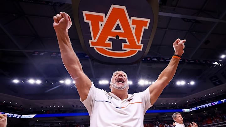 Head coach Bruce Pearl celebrates after his No. 1 Auburn Tigers blew out the Ole Miss Rebels 106-76