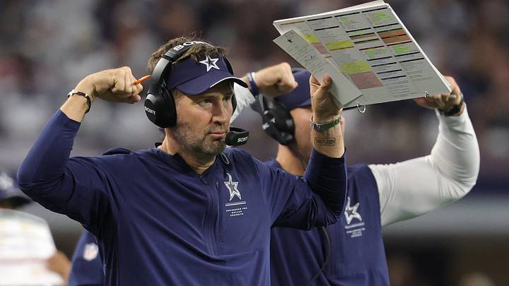 Dallas Cowboys head coach Brian Schottenheimer instructs his team from the sideline against the Washington Commanders.