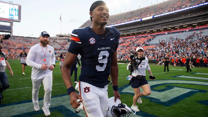 Auburn Tigers quarterback Deuce Knight (9) walks off the field after the game as Auburn Tigers take on Mercer Bears at Jordan-Hare Stadium in Auburn, Ala. on Saturday, Nov. 22, 2025. Auburn Tigers defeated the Mercer Bears 62-17.