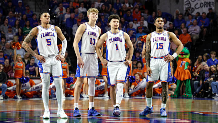 Will Richard (5), Thomas Haugh (10), Walter Clayton Jr. (1) and Alijah Martin (15) watch as Rueben Chinyelu shoots a free throw in the Florida Gators' win over Ole Miss. "In my opinion, they're a 1-seed in the NCAA Tournament," Rebels' head coach Chris Beard said. "I don't know if there's a more talented team in college basketball."