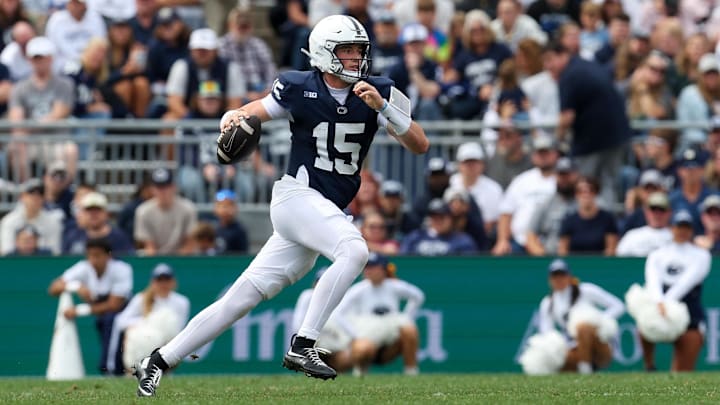 Penn State Nittany Lions quarterback Drew Allar runs with the ball during the fourth quarter against the FIU Panthers at Beaver Stadium. 