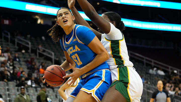 Jan 20, 2025; Newark, New Jersey, USA;  UCLA Bruins center Lauren Betts (51) looks to score against Baylor Lady Bears center Aaronette Vonleh (21) during the second half at Prudential Center. Mandatory Credit: Chris Jones-Imagn Images