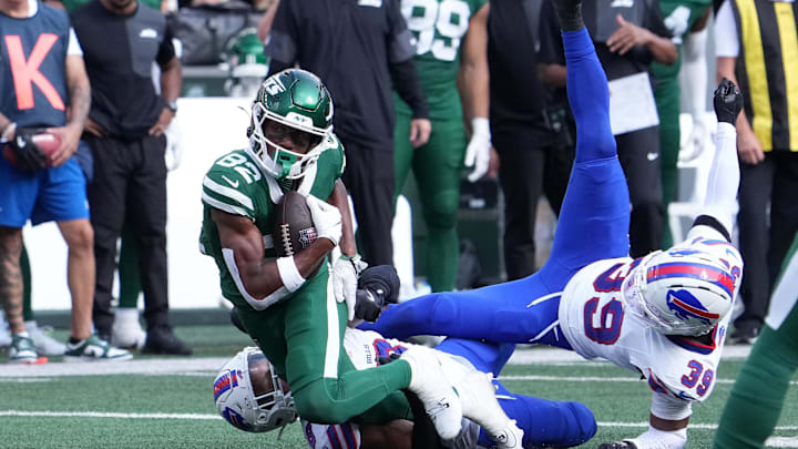 Sep 14, 2025; East Rutherford, New Jersey, USA; New York Jets wide receiver Arian Smith (82) makes a catch against the Buffalo Bills during the second half at MetLife Stadium. Mandatory Credit: Robert Deutsch-Imagn Images