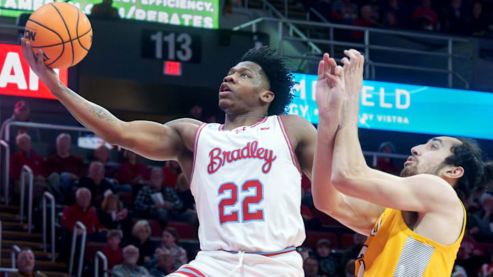 Bradley’s Jaquan Johnson, left, flies to the basket past Valparaiso’s Carter Hopoi in the first half of their college basketball game Tuesday, Feb. 3, 2026 at the Peoria Civic Center. The Braves defeated the Beacons 72-65. Bradley’s Jaquan Johnson, left, flies to the basket past Valparaiso’s Carter Hopoi in the first half of their college basketball game Tuesday, Feb. 3, 2026 at the Peoria Civic Center. The Braves defeated the Beacons 72-65.