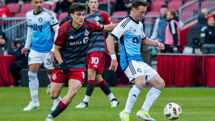 Alonso Coello #14 (L) and Brecht Dejaegere #10 (R) in action...