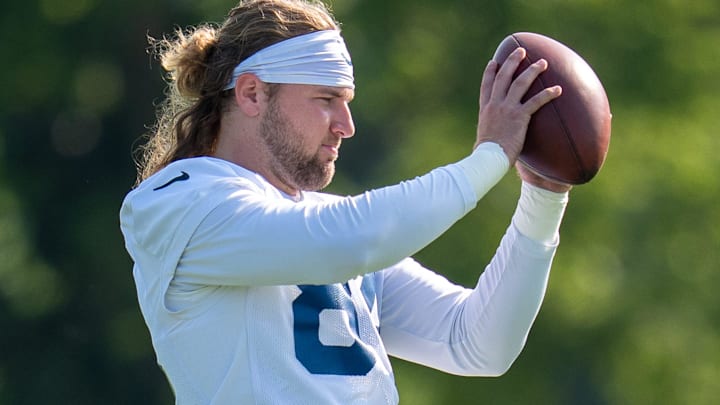 Indianapolis Colts tight end Tyler Warren (84) tosses a football Thursday, July 24, 2025, during training camp held at Grand Park in Westfield. Indianapolis Colts tight end Tyler Warren (84) tosses a football Thursday, July 24, 2025, during training camp held at Grand Park in Westfield.