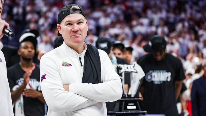 Mar 2, 2026; Tucson, Arizona, USA; Arizona Wildcats head coach Tommy Lloyd looks out to fans after they defeat the Iowa State Cyclones   at McKale Memorial Center. 
