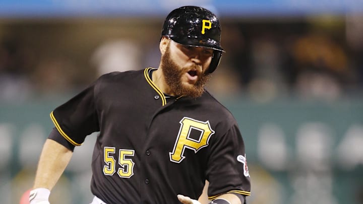 Pittsburgh Pirates catcher Russell Martin (55) reacts as he rounds the bases after hitting a three-run home run against the Milwaukee Brewers during the eighth inning at PNC Park. The Pirates won 3-2. 