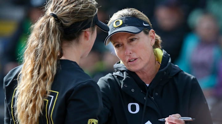 Oregon head coach Melyssa Lombardi talks with pitcher Stevie Hansen as the Oregon Ducks fell to UCLA 7-4 on Saturday, March 25, 2023, at Jane Sanders Stadium in Eugene, Ore.