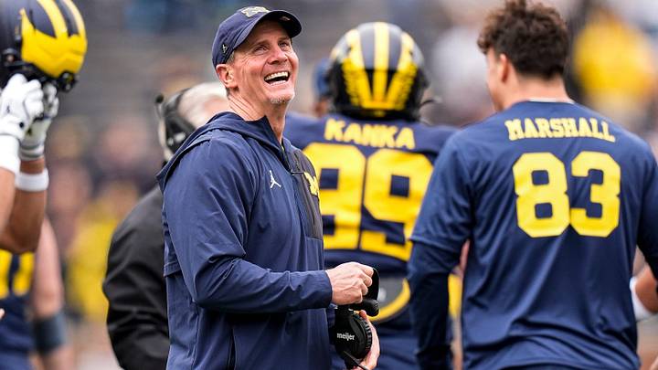 Michigan defensive coordinator Jay Hill celebrates a play during the spring game at Michigan Stadium in Ann Arbor on Saturday, April 18, 2026.