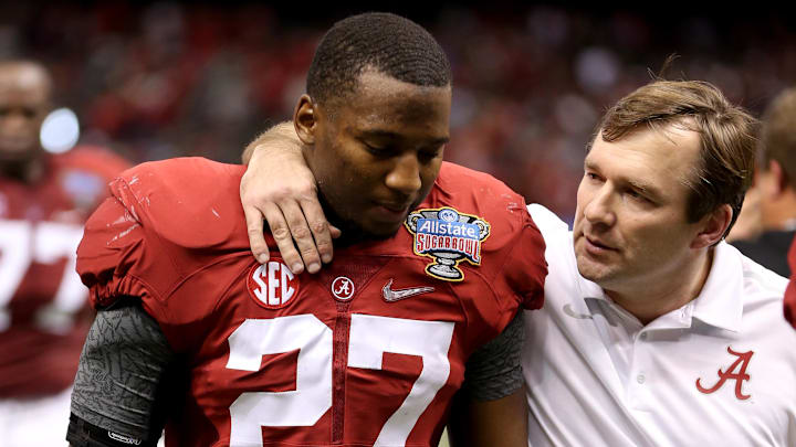 Alabama Crimson Tide defensive back Nick Perry (27) is consoled by Crimson Tide defensive coordinator Kirby Smart after the 2015 Sugar Bowl at Mercedes-Benz Superdome. Ohio State Buckeyes beat the against the Alabama Crimson Tide, 42-35.