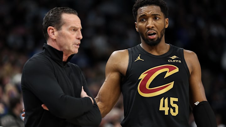 Jan 18, 2025; Minneapolis, Minnesota, USA; Cleveland Cavaliers guard Donovan Mitchell (45) talks with head coach Kenny Atkinson during the second quarter against the Minnesota Timberwolves at Target Center. Mandatory Credit: Matt Krohn-Imagn Images Jan 18, 2025; Minneapolis, Minnesota, USA; Cleveland Cavaliers guard Donovan Mitchell (45) talks with head coach Kenny Atkinson during the second quarter against the Minnesota Timberwolves at Target Center. Mandatory Credit: Matt Krohn-Imagn Images