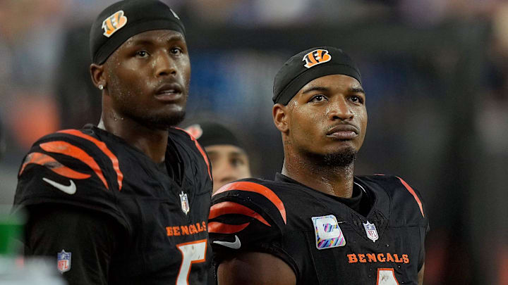 Cincinnati Bengals wide receiver Tee Higgins (5) and wide receiver Ja'Marr Chase (1) watch the score board as their team lose to the Detroit Lions 24-37 at Paycor Stadium on October 5, 2025.