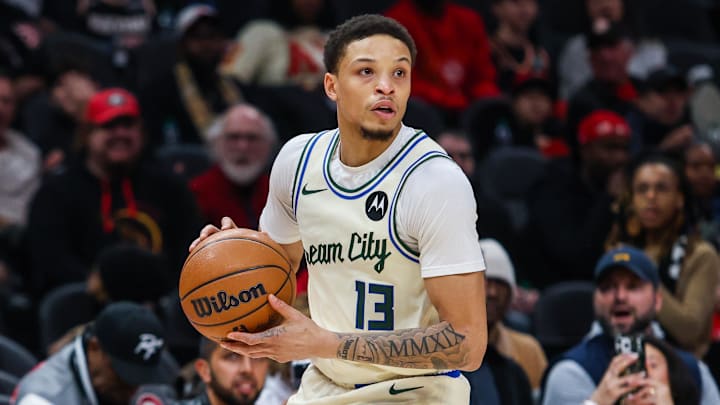 Jan 19, 2026; Atlanta, Georgia, USA; Milwaukee Bucks guard Ryan Rollins (13) looks to pass the ball against the Atlanta Hawks during the first quarter at State Farm Arena. 