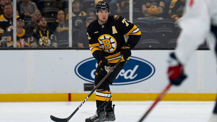 Sep 20, 2026; Boston, Massachusetts, USA;  Boston Bruins defenseman Charlie McAvoy (73) skates with the puck during the first period of the game against the Washington Capitals at TD Garden.  Mandatory Credit: Natalie Reid-Imagn Images