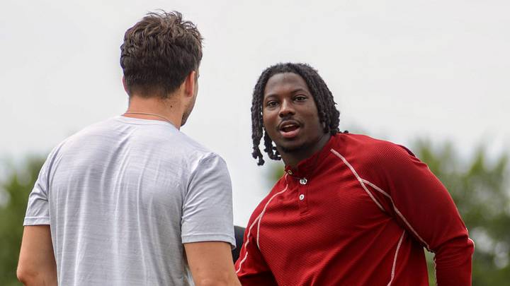 Oklahoma linebacker Kip Lewis talks to Owen Heinecke during one of the Brent Venables Football Camps this summer. Oklahoma linebacker Kip Lewis talks to Owen Heinecke during one of the Brent Venables Football Camps this summer.