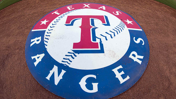 Jul 31, 2015; Arlington, TX, USA; A view the Texas Rangers logo and on deck circle before the game between the Texas Rangers and the San Francisco Giants at Globe Life Park in Arlington. The Rangers defeated the Giants 6-3. Mandatory Credit: Jerome Miron-Imagn Images Jul 31, 2015; Arlington, TX, USA; A view the Texas Rangers logo and on deck circle before the game between the Texas Rangers and the San Francisco Giants at Globe Life Park in Arlington. The Rangers defeated the Giants 6-3. Mandatory Credit: Jerome Miron-Imagn Images